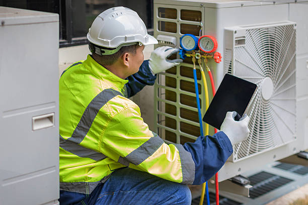 Professional Heat Pump Repair technician working in Jean, NV